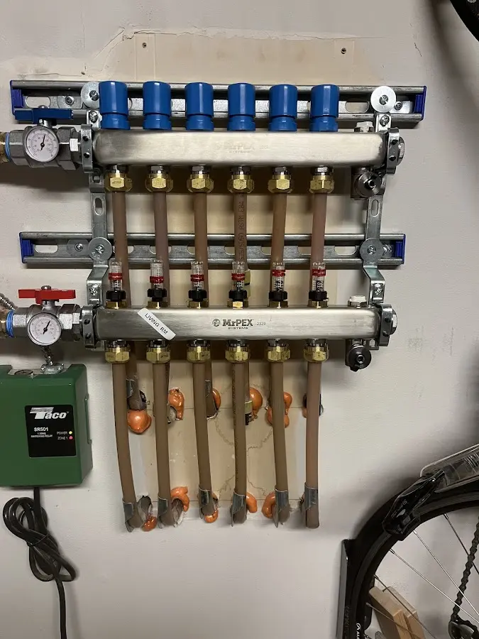 Plumber performing Water Heater Repair at a residential property in Warner Robins